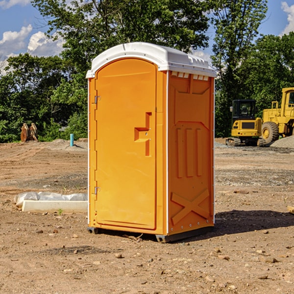 what is the cost difference between standard and deluxe portable restroom rentals in Greens Fork